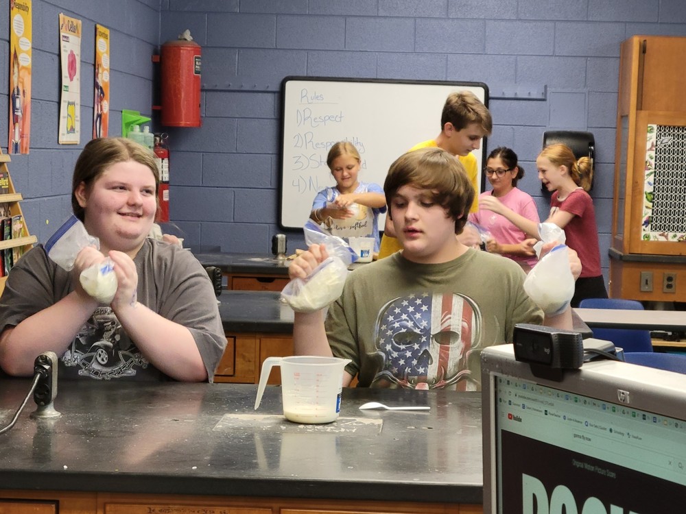 Students doing science experiment