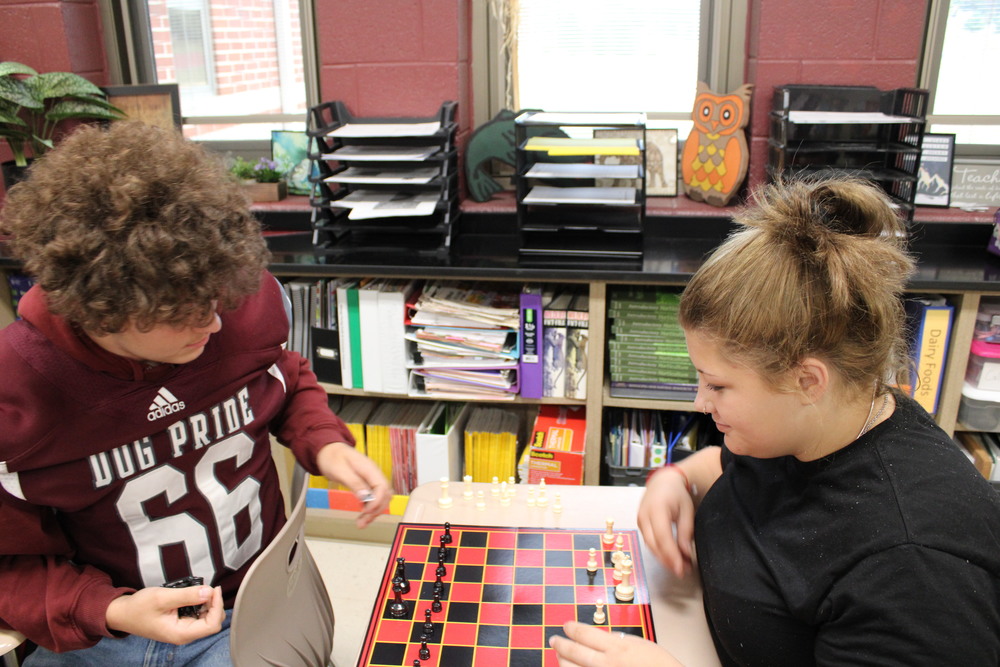 Students playing chess