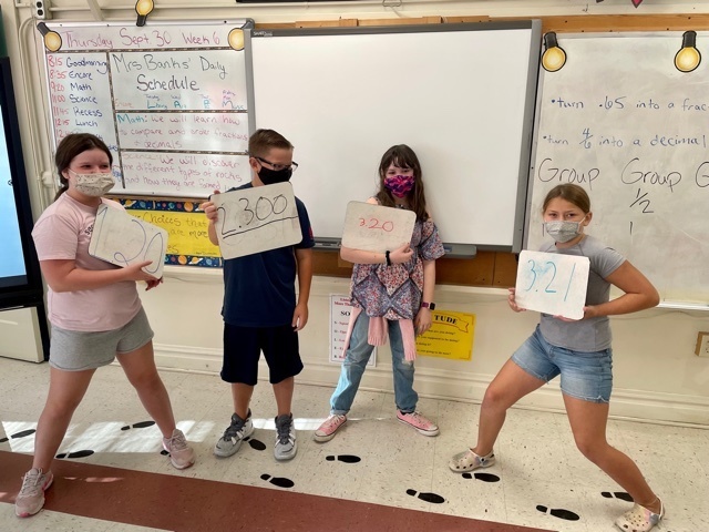 students learning fractions and decimals