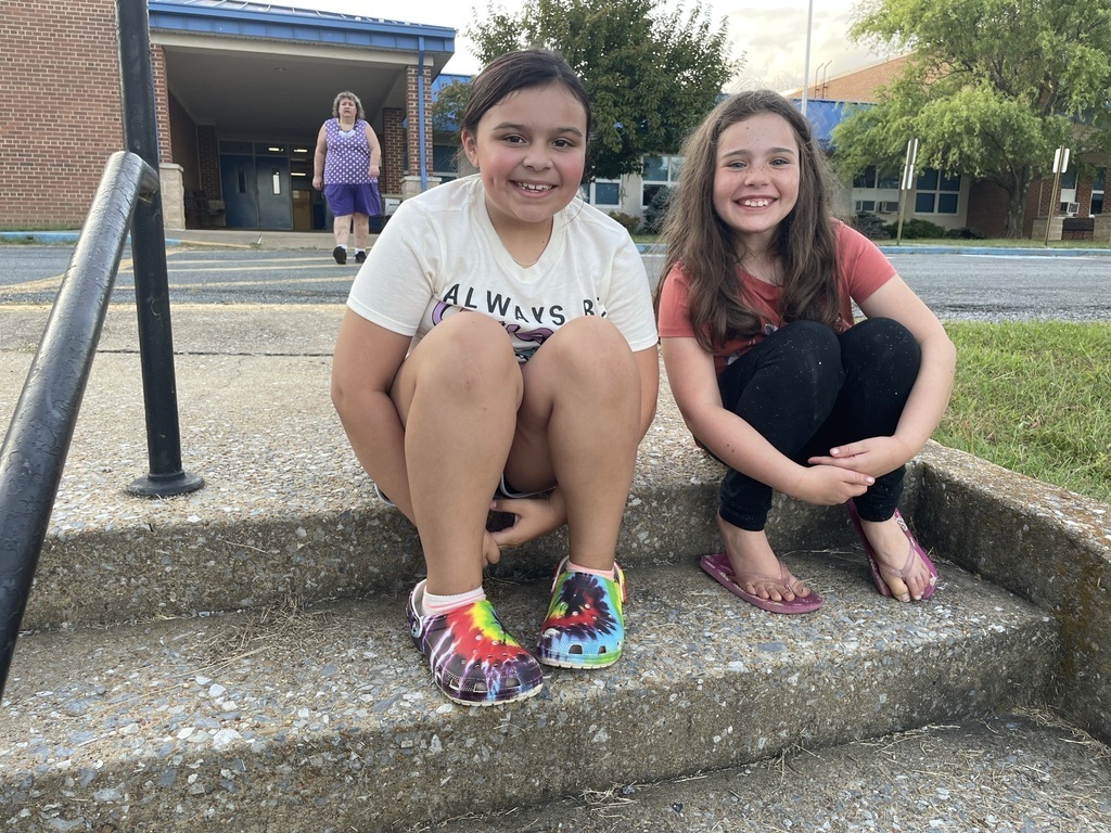 students sitting on the steps