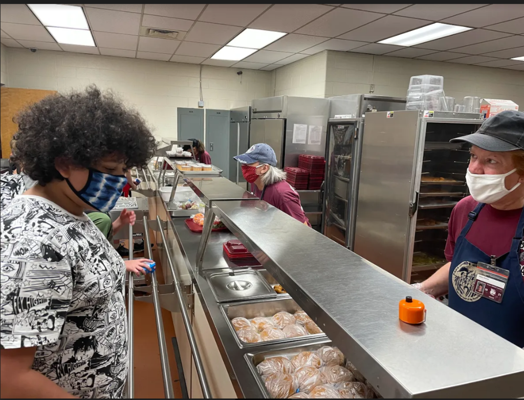 students being served lunch at lms