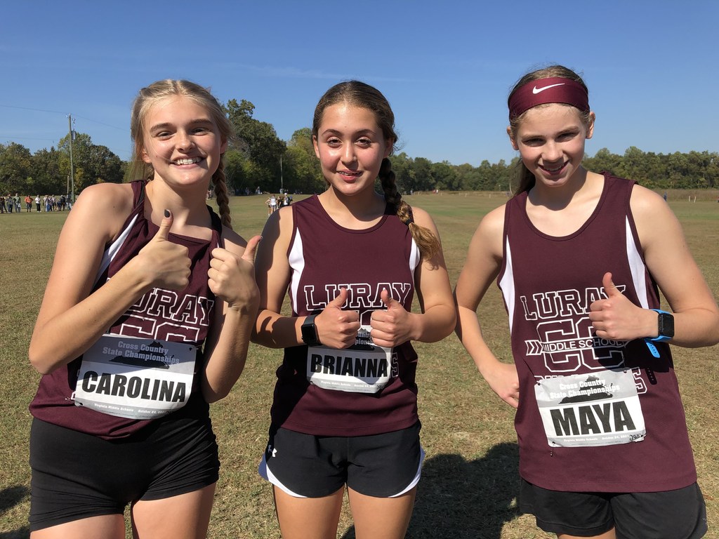 Carolina, Brianna, and Maya LMS cross country runners for state title