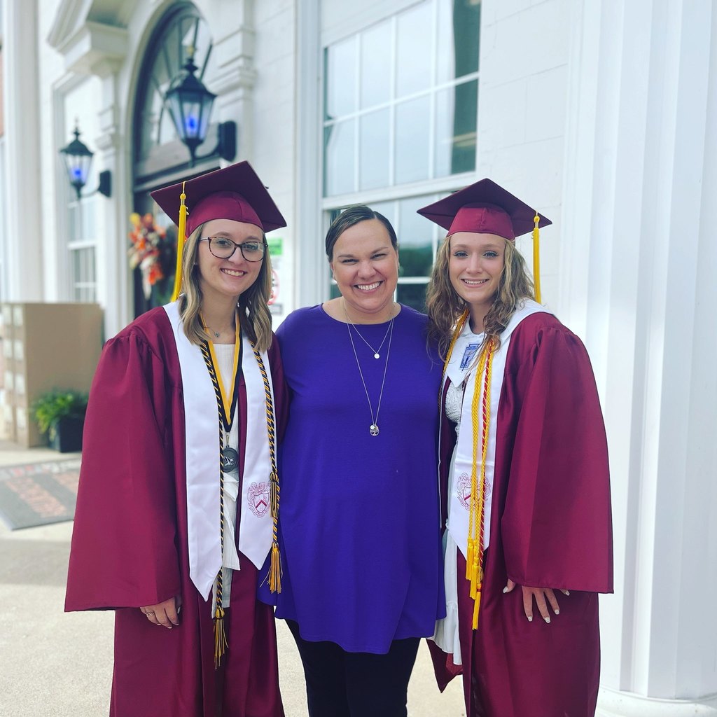 class of 2022 two senior girls with principal at Shenandoah Elementary School
